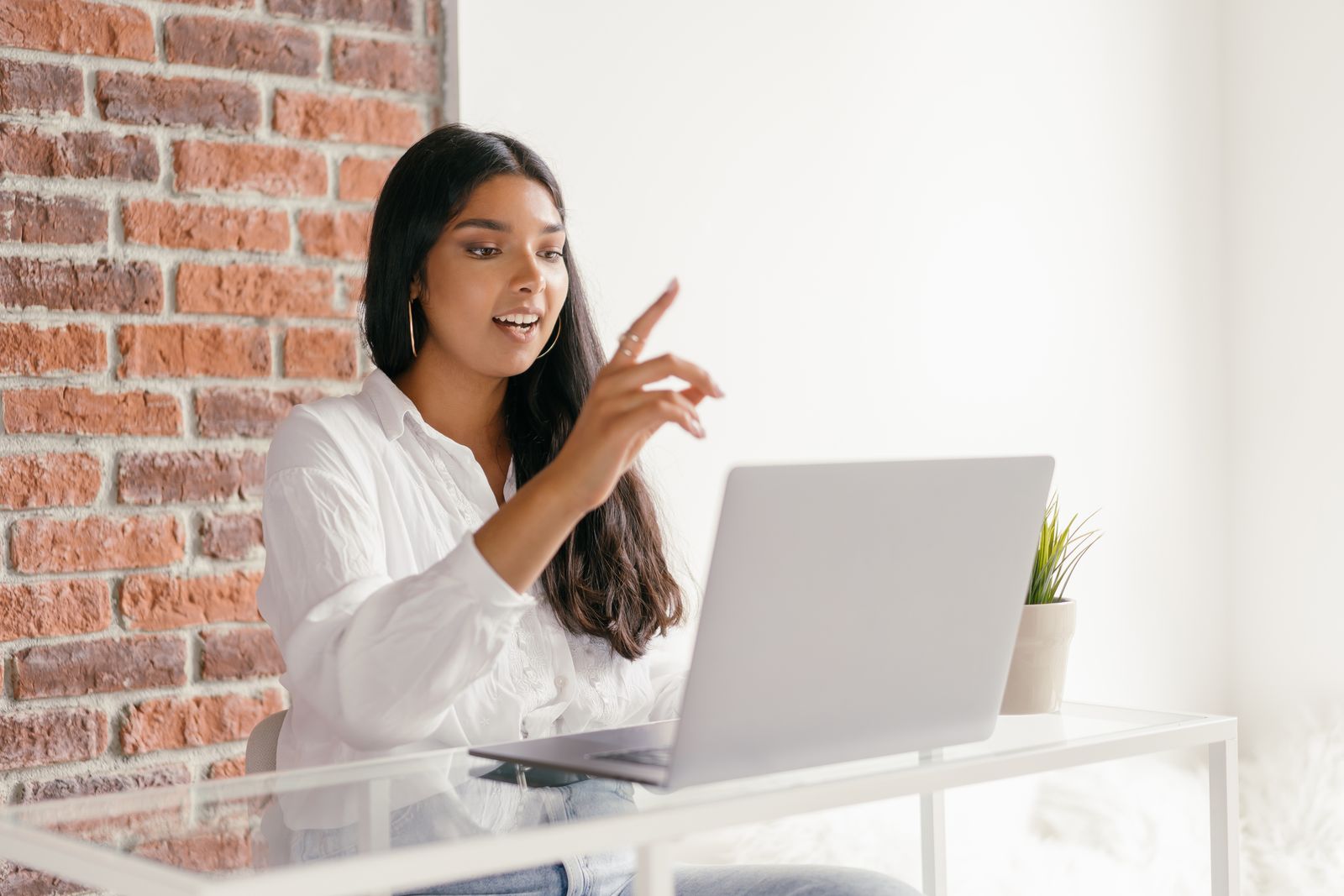 Professional participating in a video call from a home workspace